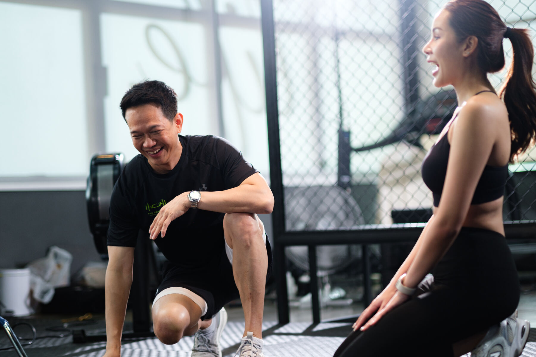 A coach working closely with a member
